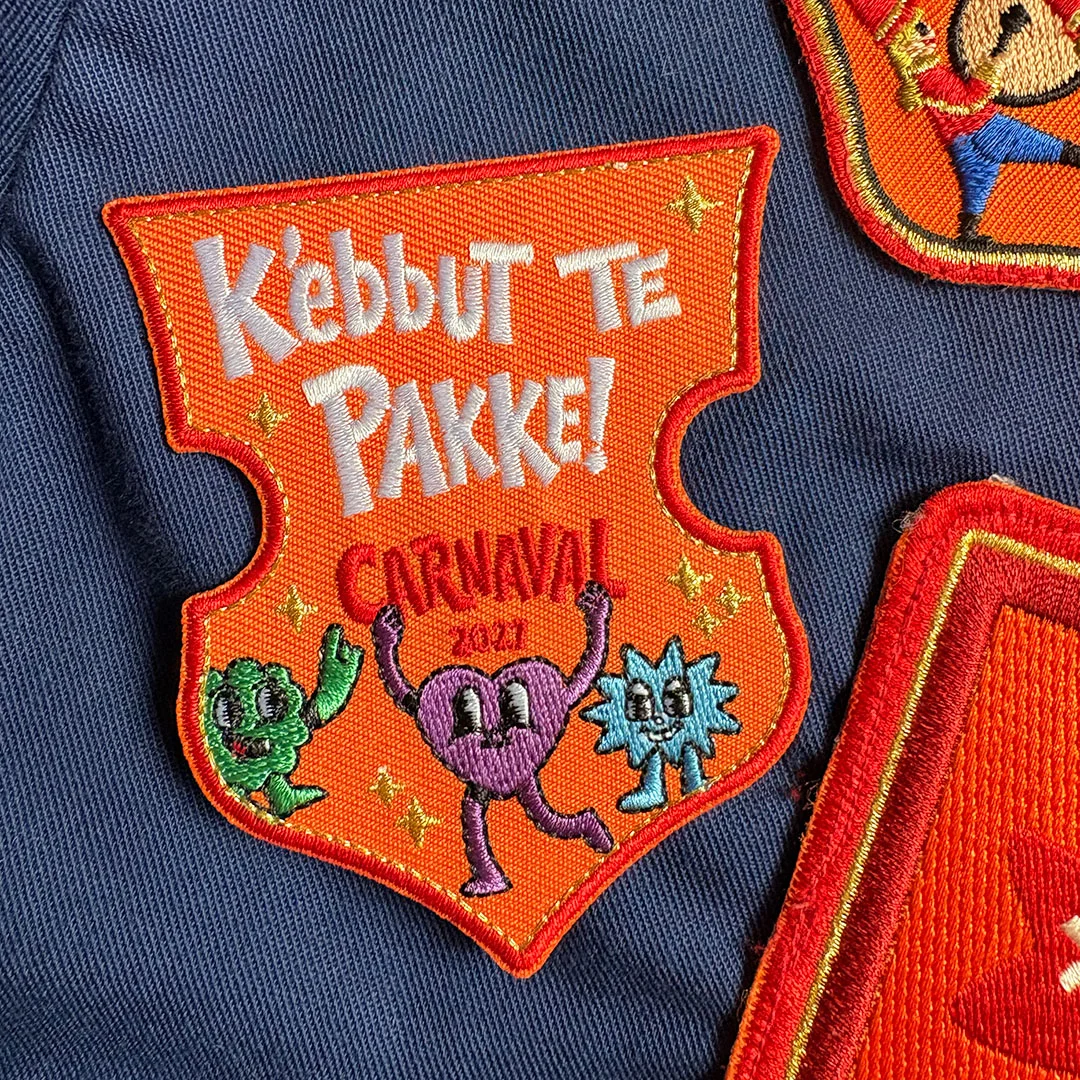 K'ebbut te pakke - motto 2027 - Kebbuttepakke mottokielegat2027 kielegatemblemen - IN100-12